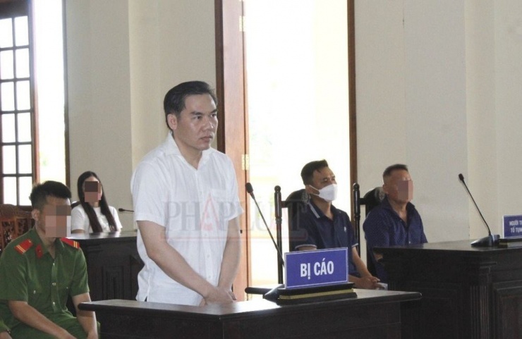Bị cáo Lê Tấn Nguyên tại tòa ngày 26-4. Ảnh: NHẪN NAM