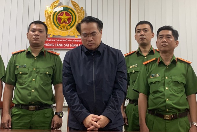Ông Đặng Việt Hà lúc bị bắt. Ảnh: Công an TP HCM