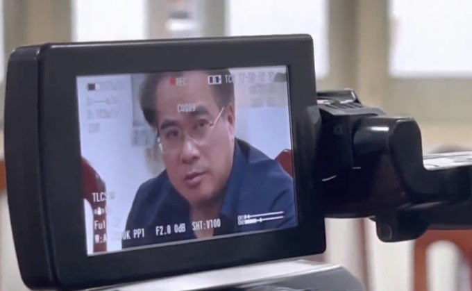 Ông Đặng Việt Hà lúc bị Công an TP HCM triệu tập làm việc, sau đó bắt tạm giam, tháng 1/2023. Ảnh: Công an TP HCM