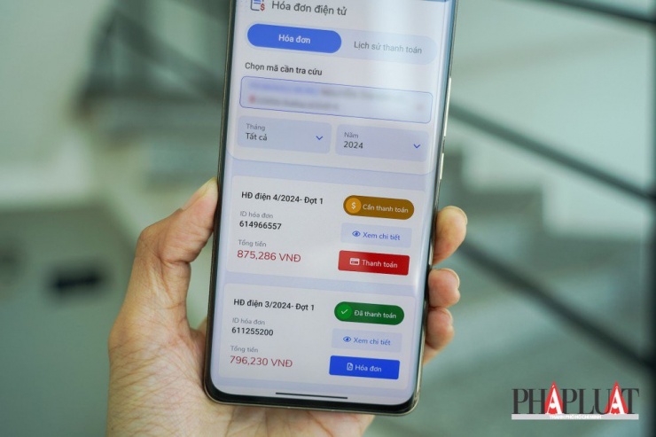 Tra cứu hóa đơn tiền điện và thanh toán tiền điện online trên ứng dụng EVNHCMC. Ảnh: MINH HOÀNG