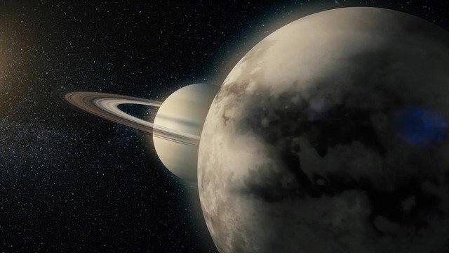 Mặt trăng sự sống Titan với Sao Thổ ở hậu cảnh - Ảnh: Media Whale Stock / Adobe