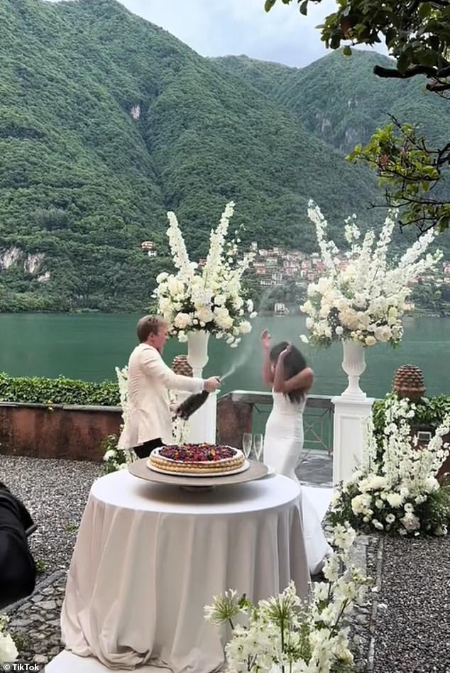 Cole Hennessey phun rượu sâm panh lên khắp người cô dâu của mình trong tiệc cưới của họ ở Hồ Como.