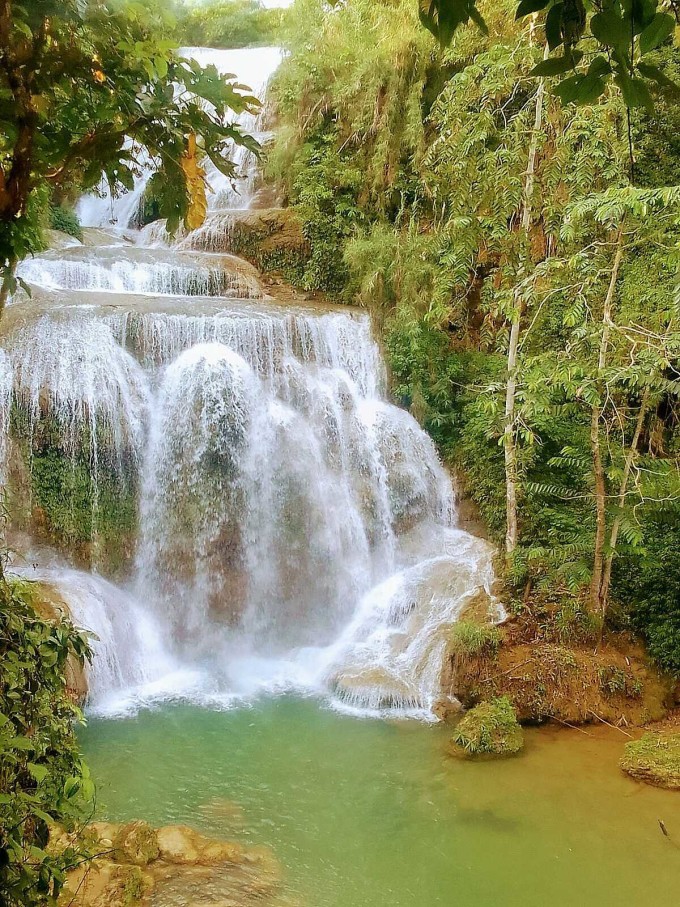 Một con thác trên dòng suối Mu. Ảnh: Mai Quách