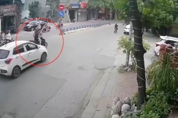 Clip: Sang đường không quan sát, cô gái bị ô tô hất văng trượt dài trên đường