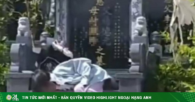 Bé gái xin ngủ cạnh mộ ông bà khiến nhiều người xúc động