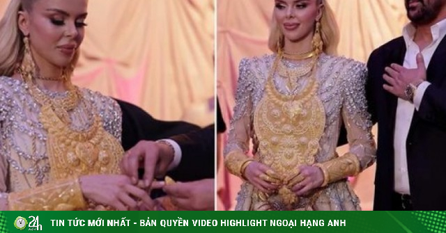 Cô dâu di chuyển khó khăn vì đeo vàng kín người trong lễ đính hôn
