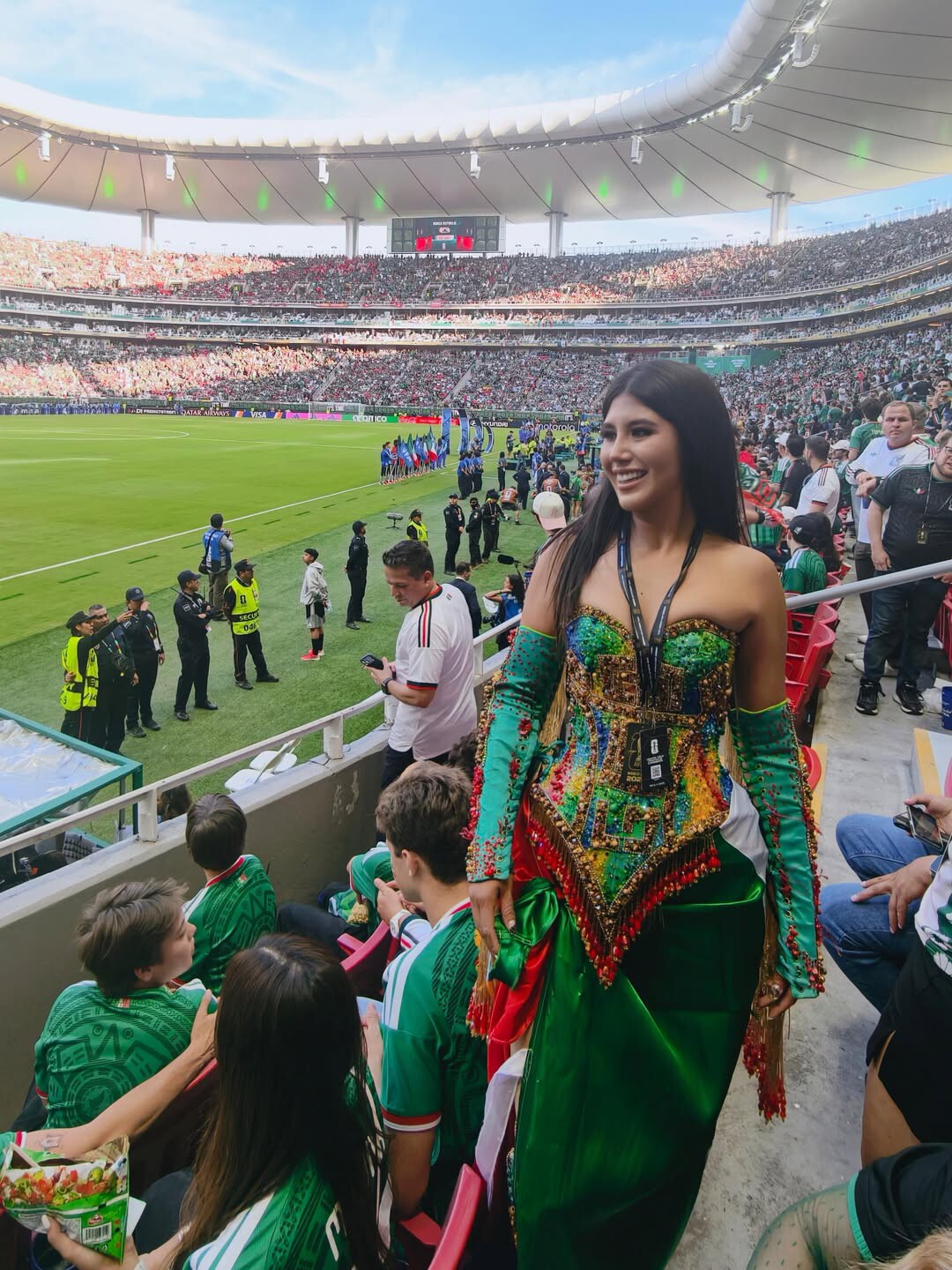 Mexican beauty wears daring outfit, showing off her hot figure in the stands - 4