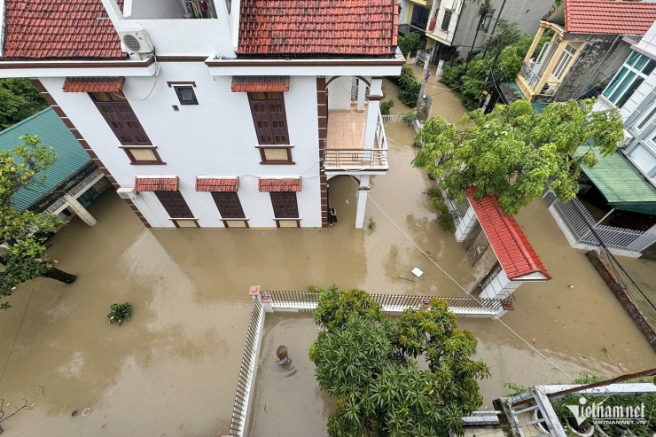 Nước ngập mênh mông tại nhiều khu dân cư ở Hải Phòng, Quảng Ninh - 9