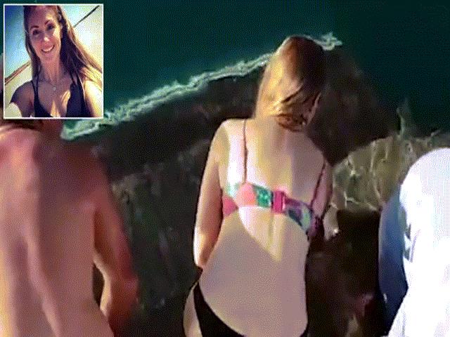 Cô gái Úc bất ngờ bị cá mập khổng lồ kéo xuống nước