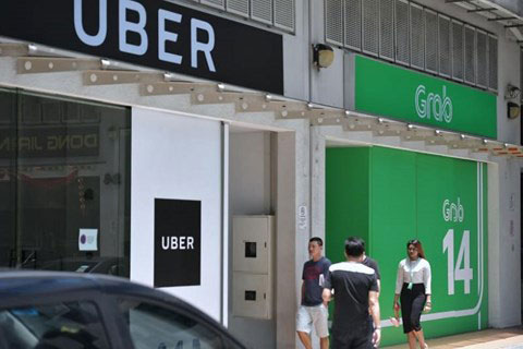 Thương vụ Grab mua Uber có thể bị hủy bỏ, Grab đối mặt với án phạt tài chính - 1