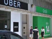 Tài chính - Bất động sản - Thương vụ Grab mua Uber có thể bị hủy bỏ, Grab đối mặt với án phạt tài chính