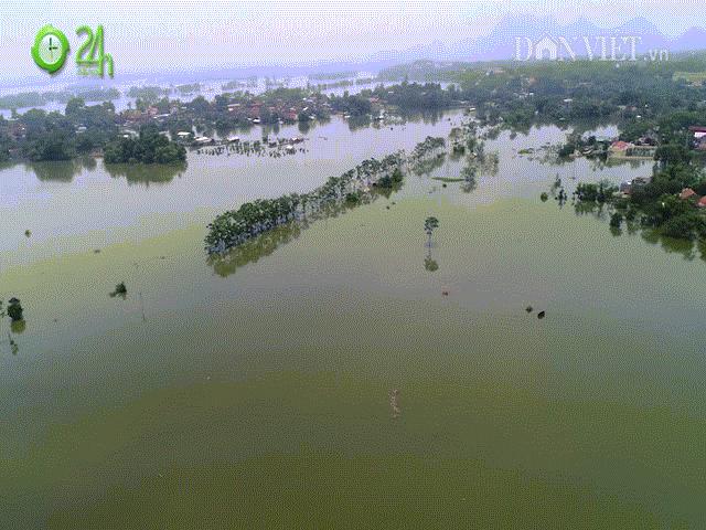 Flycam: Toàn cảnh ”túi nước” khổng lồ trên đê sông Bùi ở rốn lũ Chương Mỹ