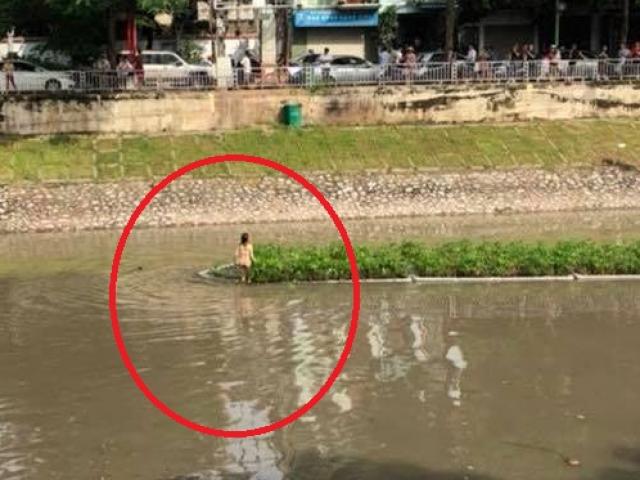 Tin mới vụ cô gái trẻ cởi đồ bơi ra giữa sông Tô Lịch nhảy múa