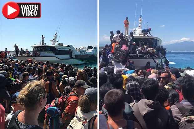 Hãi hùng cảnh du khách đổ xô lên tàu vì sợ sóng thần ở Indonesia - 1