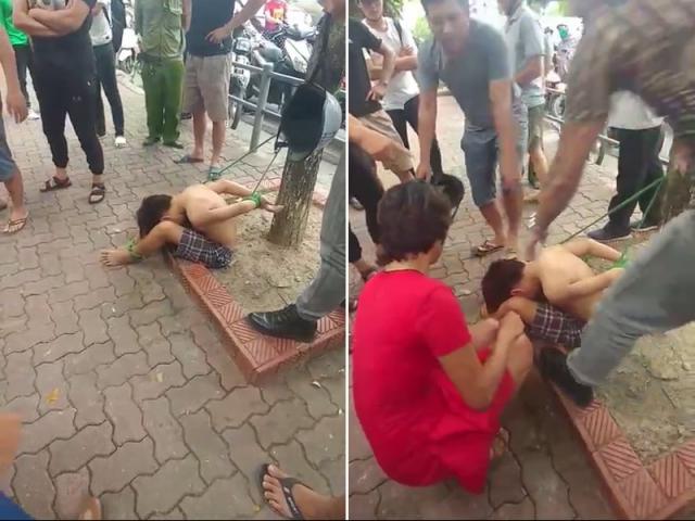 Clip: Bé trai bị trói tay chân vào gốc cây ở Hà Nội khiến cư dân mạng phẫn nộ