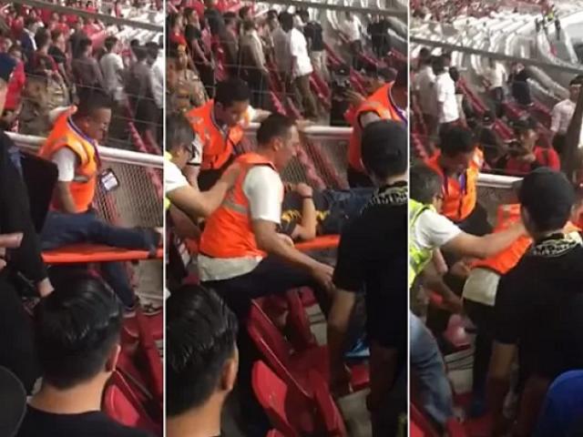 CĐV Malaysia bị ném đá, xô xát, cầu thủ thoát thân bằng xe bọc thép sau khi thắng Indonesia