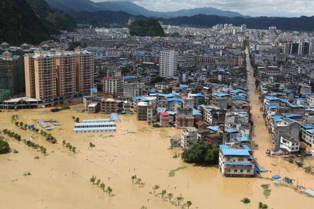 Mưa lũ lịch sử nhấn chìm nhiều nơi tại miền Nam Trung Quốc. Ảnh minh họa: Reuters