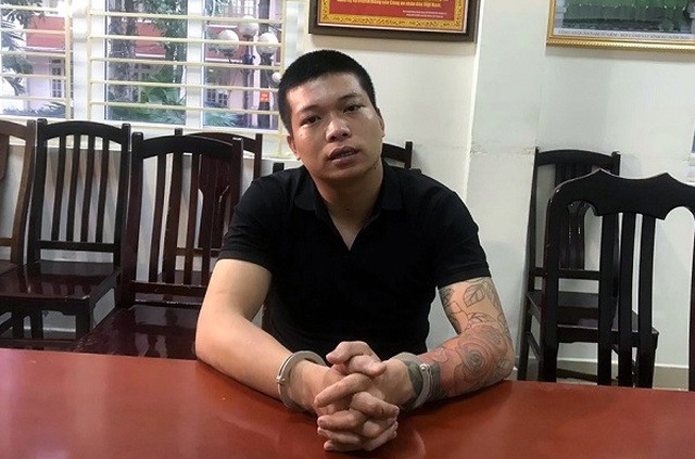 Nguyễn Khắc Hải tại trụ sở công an.