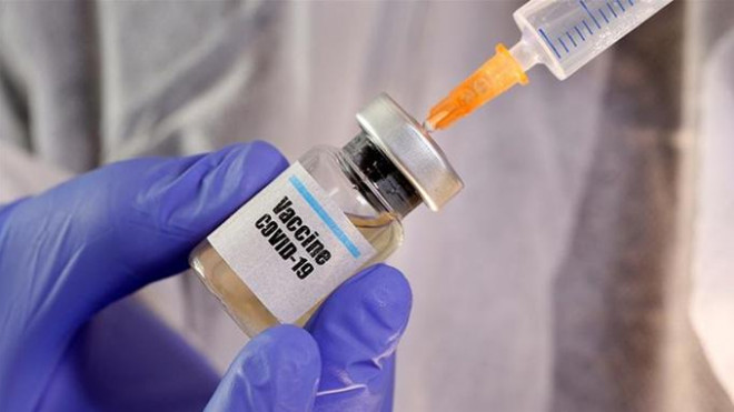 Thế giới vẫn mong ngóng Vắc xin phòng COVID-19. Ảnh: Reuters