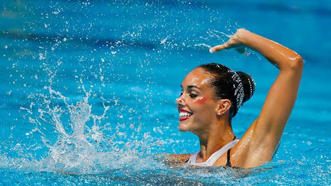 Cô đã giành tổng cộng 23 huy chương bơi lội các loại trong sự nghiệp, là VĐV bơi lội sở hữu số huy chương thuộc loại nhiều nhất trong lịch sử nội dung bơi nghệ thuật.

