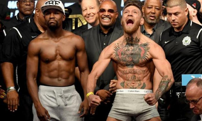 Theo ông White, lần này Mayweather (trái) chủ động muốn tái đấu McGregor (phải)