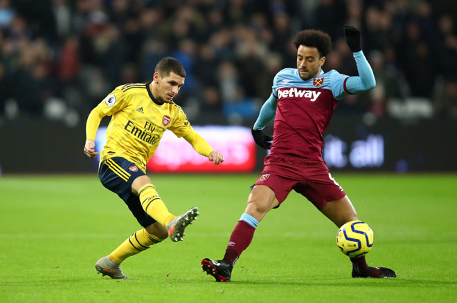 Torreira (trái) và Anderson