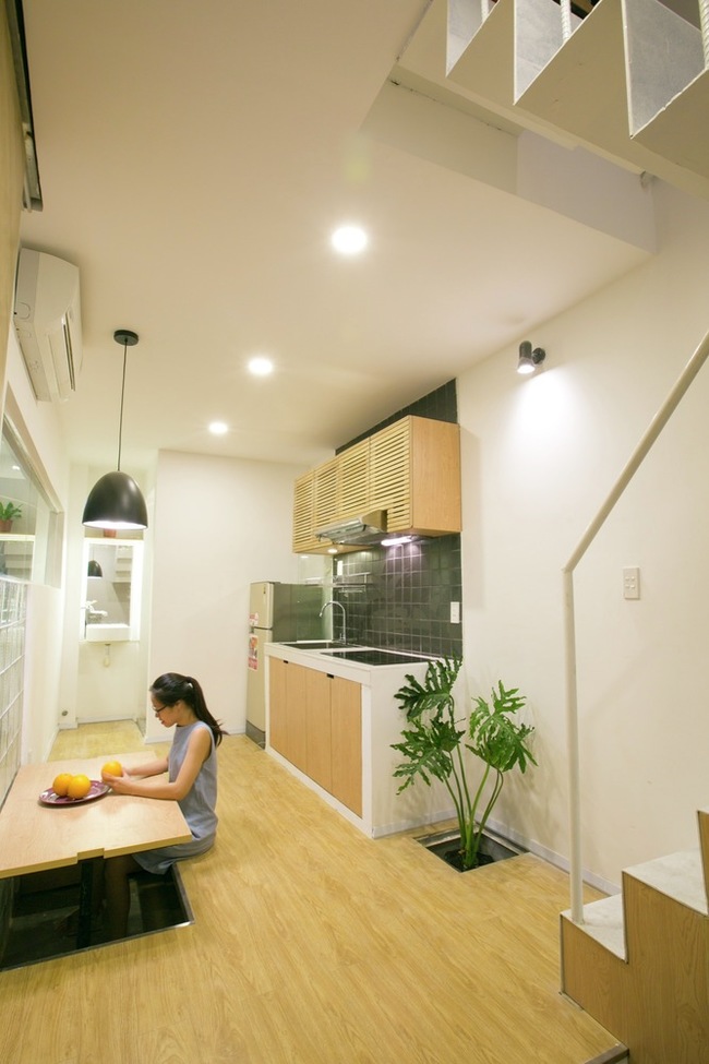 Tầng trệt kết hợp phòng sinh hoạt chung của gia đình, phòng ăn tối và nhà bếp.
