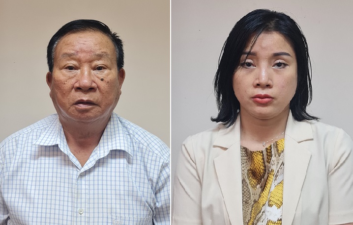 Phạm Huy Lập và Phạm Thị Kim Oanh tại trụ sở công an.