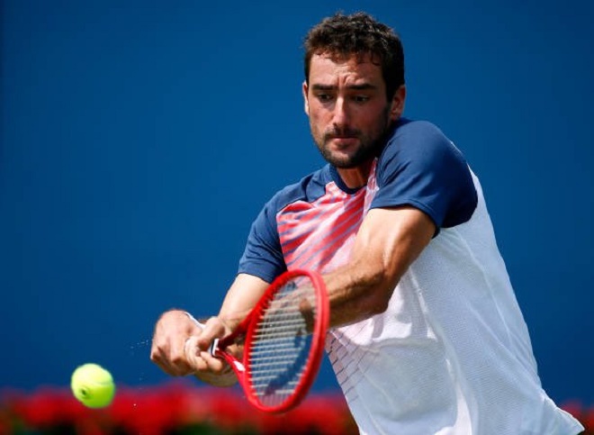 Cilic vất vả đi tiếp