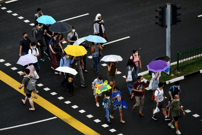 Singapore đang là quốc gia có tỷ lệ tiêm chủng cao nhất thế giới. Ảnh: Straits Times&nbsp;