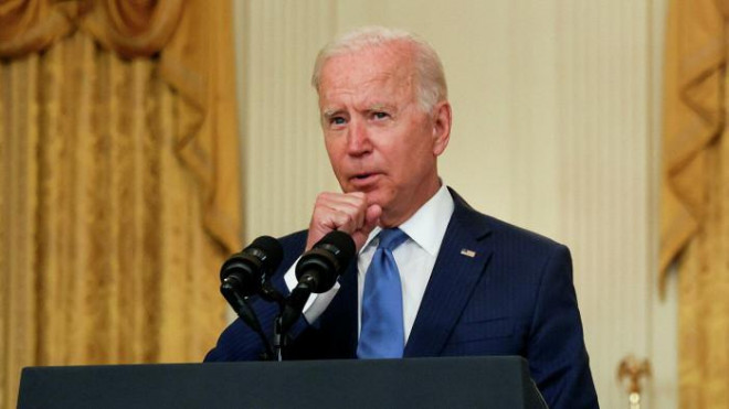 Tổng thống Mỹ Joe Biden nhiều lần bị ho trong lúc phát biểu. Ảnh - Reuters