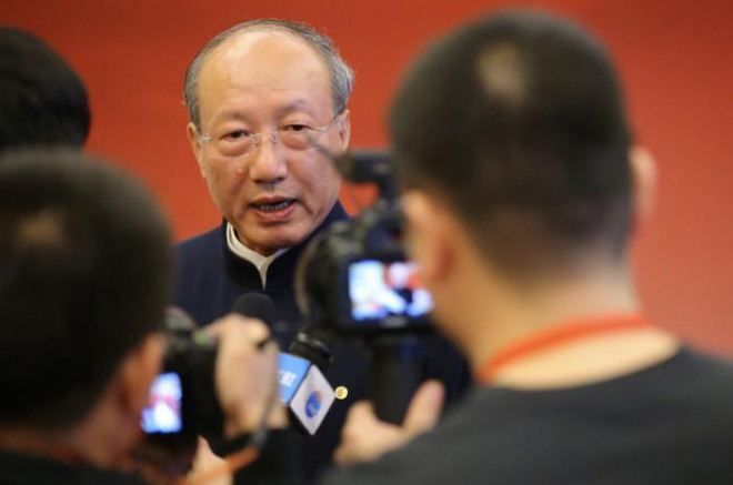 Chủ tịch tập đoàn HNA Chen Feng. Ảnh - Reuters