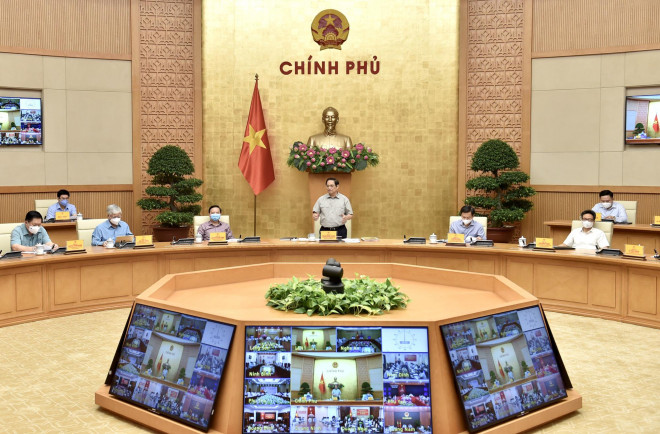Thủ tướng Phạm Minh Chính chủ trì cuộc họp của Ban Chỉ đạo quốc gia phòng chống dịch Covid-19 ngày 25-9 Ảnh: Nhật Bắc