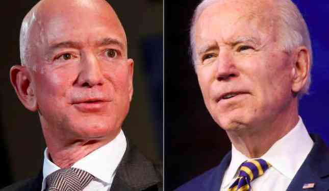 Tỷ phú Jeff Bezos (trái) và Tổng thống Mỹ Joe Biden
