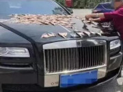 Kinh doanh - Sự thật sau hình ảnh dùng ô tô Rolls-Royce phơi cá gây xôn xao MXH