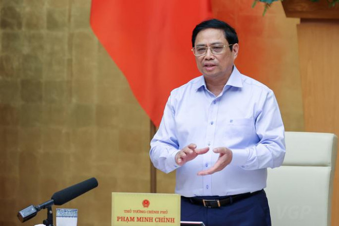 Thủ tướng Phạm Minh Chính kết luận phiên họp Chính phủ thường kỳ tháng 7 - Ảnh: Nhật Bắc