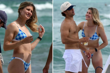 Mỹ nhân tennis Bouchard mặc bikini, ôm trai lạ giữa bãi biển