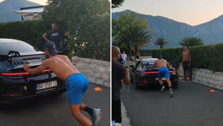 Djokovic cởi trần đẩy một chiếc ô tô thể thao đi phăm phăm
