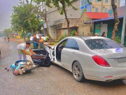 Tin tức ô tô - Tài xế xe máy tông gãy cửa Mercedes-Benz S400, nguyên nhân vụ việc gây tranh cãi