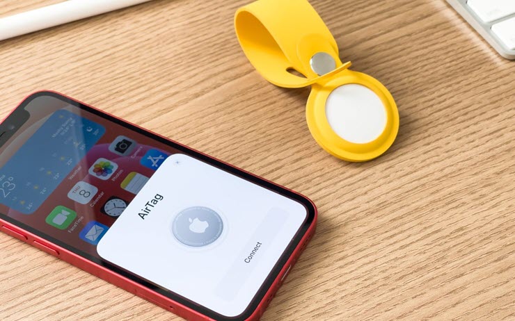 iPhone và pop-up kết nối của thiết bị sử dụng Bluetooth (AirTags).