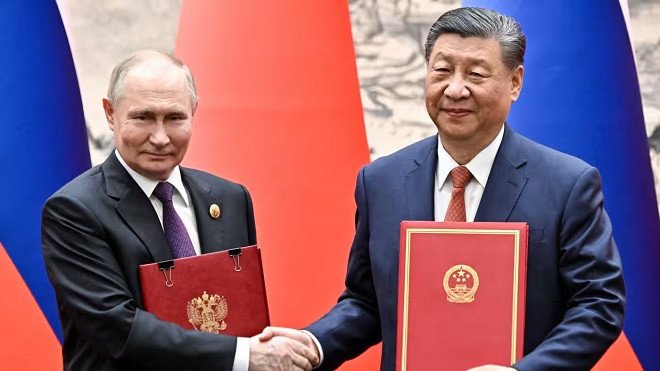 Tổng thống Nga Vladimir Putin gặp Chủ tịch Trung Quốc Tập Cận Bình ở Bắc Kinh. Ảnh: Sputnik