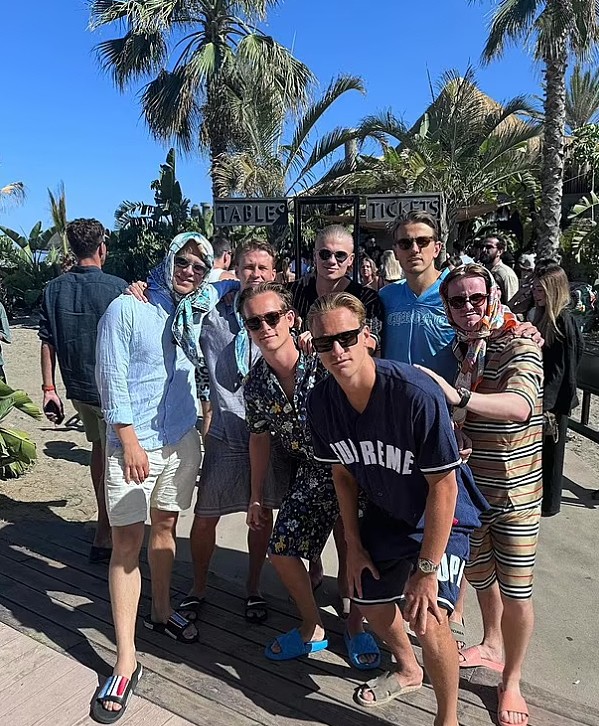 Haaland (wearing glasses, center) and friends on vacation in Marbella, Spain.