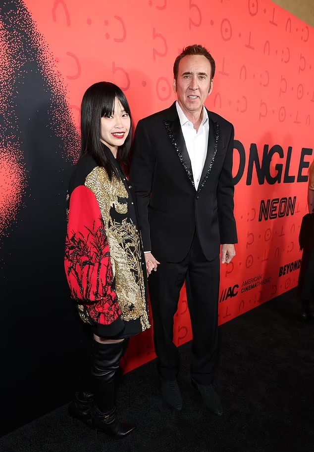 Nicolas Cage và vợ hiện tại, Riko Shibata. Ảnh: Neon