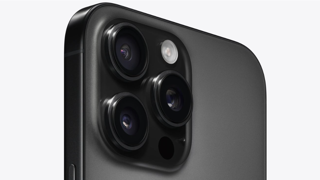 Close-up of the rear camera cluster of the iPhone 16 Pro.