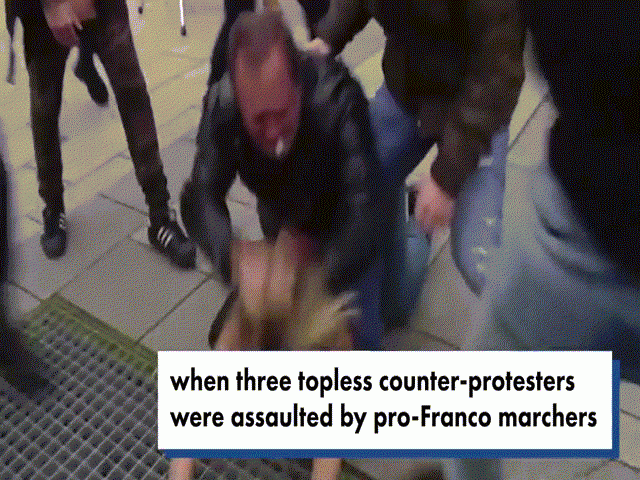 Ba cô gái ngực trần biểu tình bị đánh hội đồng ở Tây Ban Nha - 1