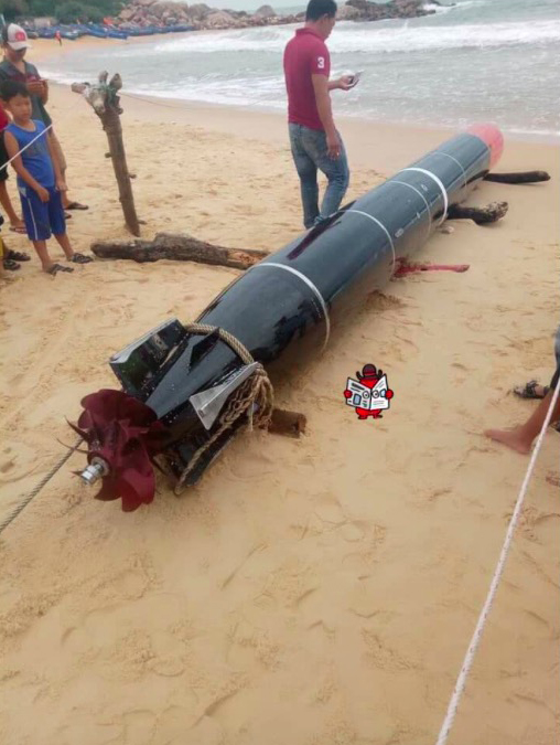 Phát hiện thêm vật thể lạ mắc lưới ngư dân trên biển Quảng Bình - 1