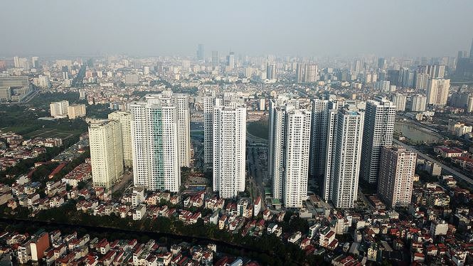 Nhiều dự án chung cư cao tầng tiếp tục được xây dựng, gâp áp lực đô thị.
