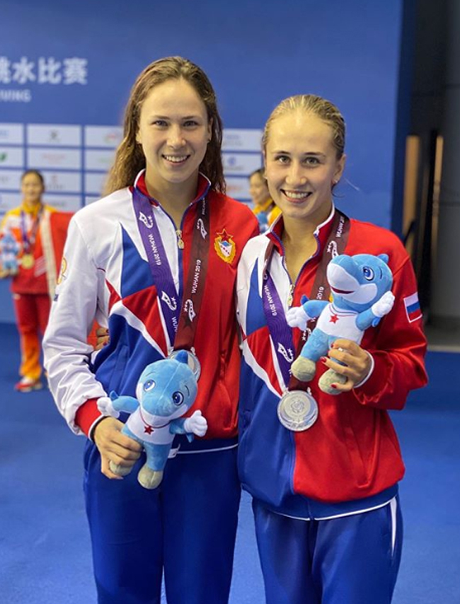 Yulia cùng đồng đội giành tấm HCB môn nhảy cầu tại Trung Quốc.
