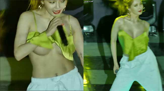 HyunA đang biểu diễn hit Roll Deep, vì thực hiện vũ đạo động tác khá mạnh khiến áo bung ra.