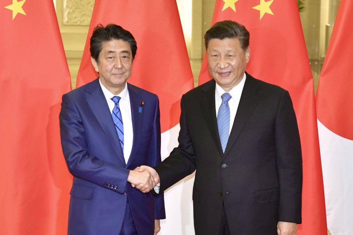 Ông Tập gặp Thủ tướng Nhật Bản Shinzo Abe ở Bắc Kinh hôm 23.12.